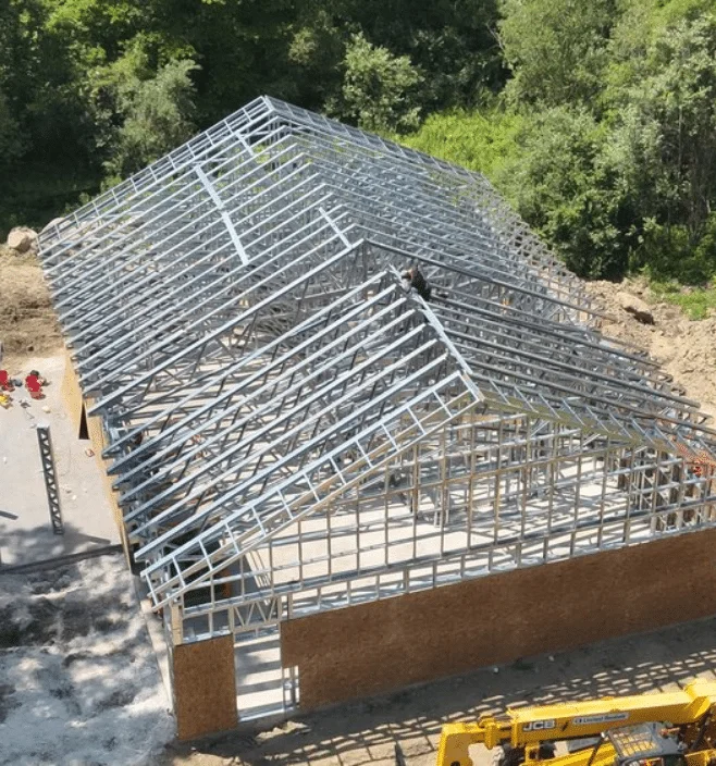 Aerial view of steel frame barndominium construction in Mississippi