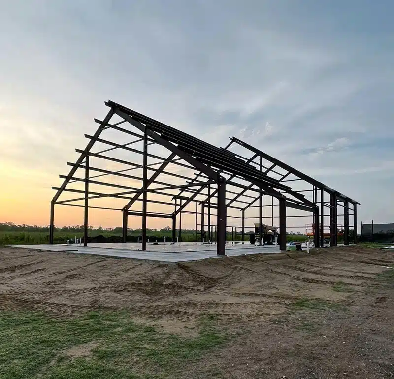 Barndominium frame at sunset in Mississippi